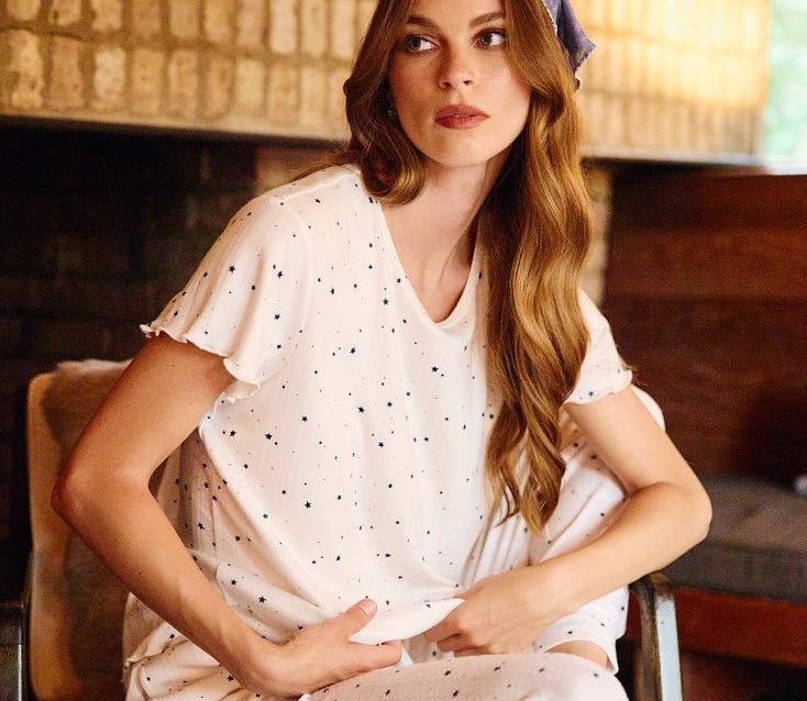Model in the SEAS Doze cozy knit set, with the top styled as a wear-out separate