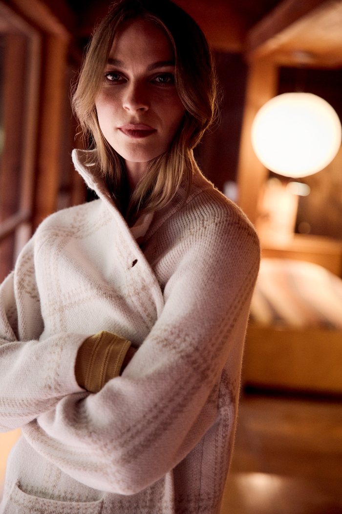 Model in a long Riverbank Coatigan over a fitted base, showing how length elevates a simple fall outfit