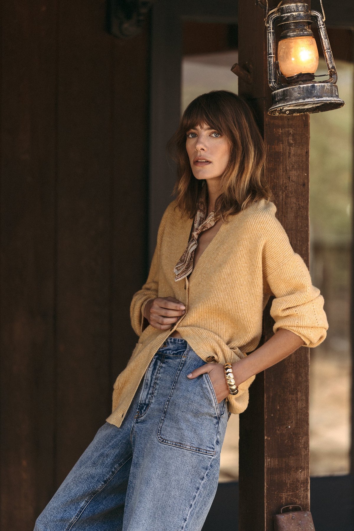 SEAS Holiday 2025 Look 1 - Callie V Neck Cardigan in Heather Golden, Dusk Patch Pocket Straight Jean in Tides