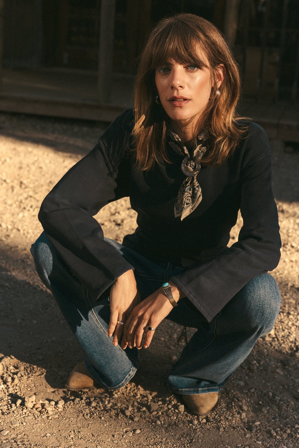 SEAS Holiday 2025 Look 13 - Blaze Fitted Sweatshirt in Mariner Midnight, Sojourn Flare Leg Jean in Rip Tide